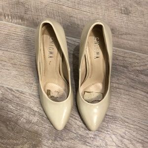 Beige Four Inch Closed Toe Pointed Heel